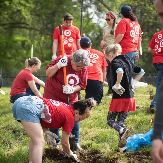 Target employees volunteering to plant trees.