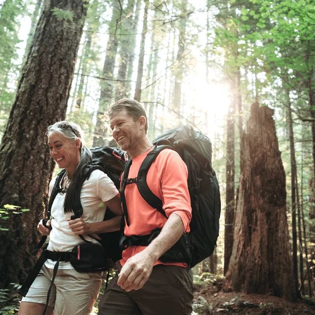 Couple hiking through the woods