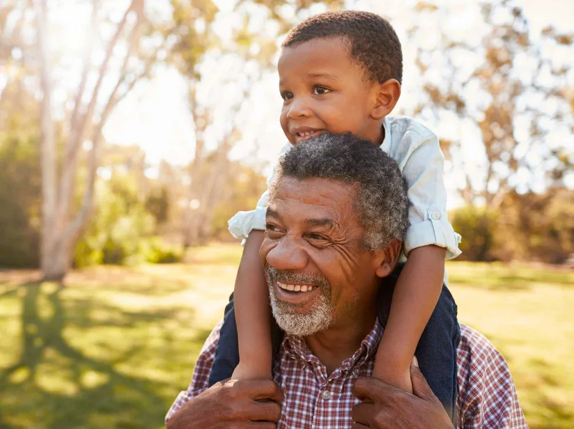 Man and son on shoulders